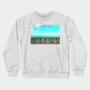 View from Numana Bassa at beach with parasols and sun loungers, fisherman with fishing rod, sea and red kayak Crewneck Sweatshirt